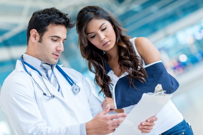 Clinician and patient going through the results together before lump removal surgery
